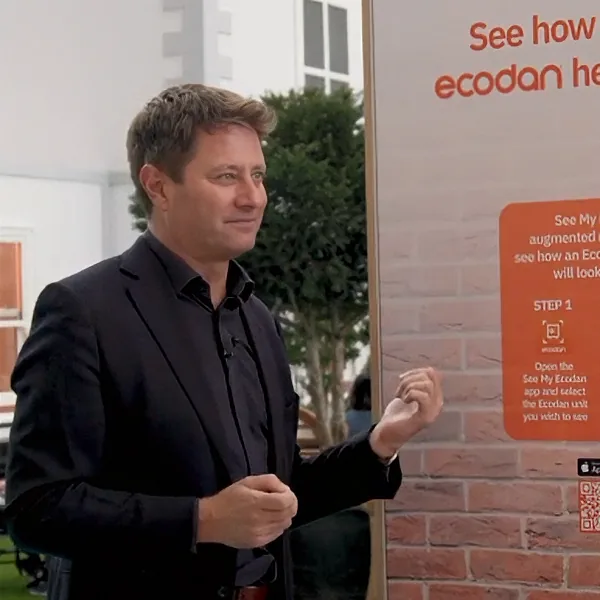 George Clarke demonstrating See My Ecodan at the Ideal Home Show 2025